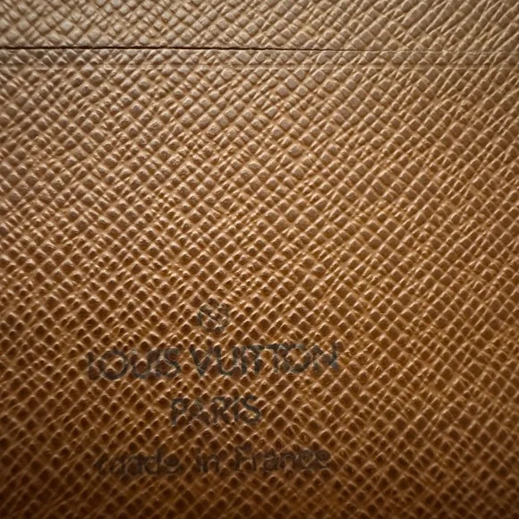 Louis Vuitton men’s multiple monogram wallet.